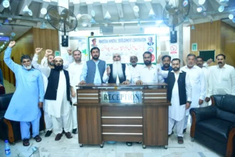 PMDC workers and union representatives discussing the Warcha rock salt lease dispute